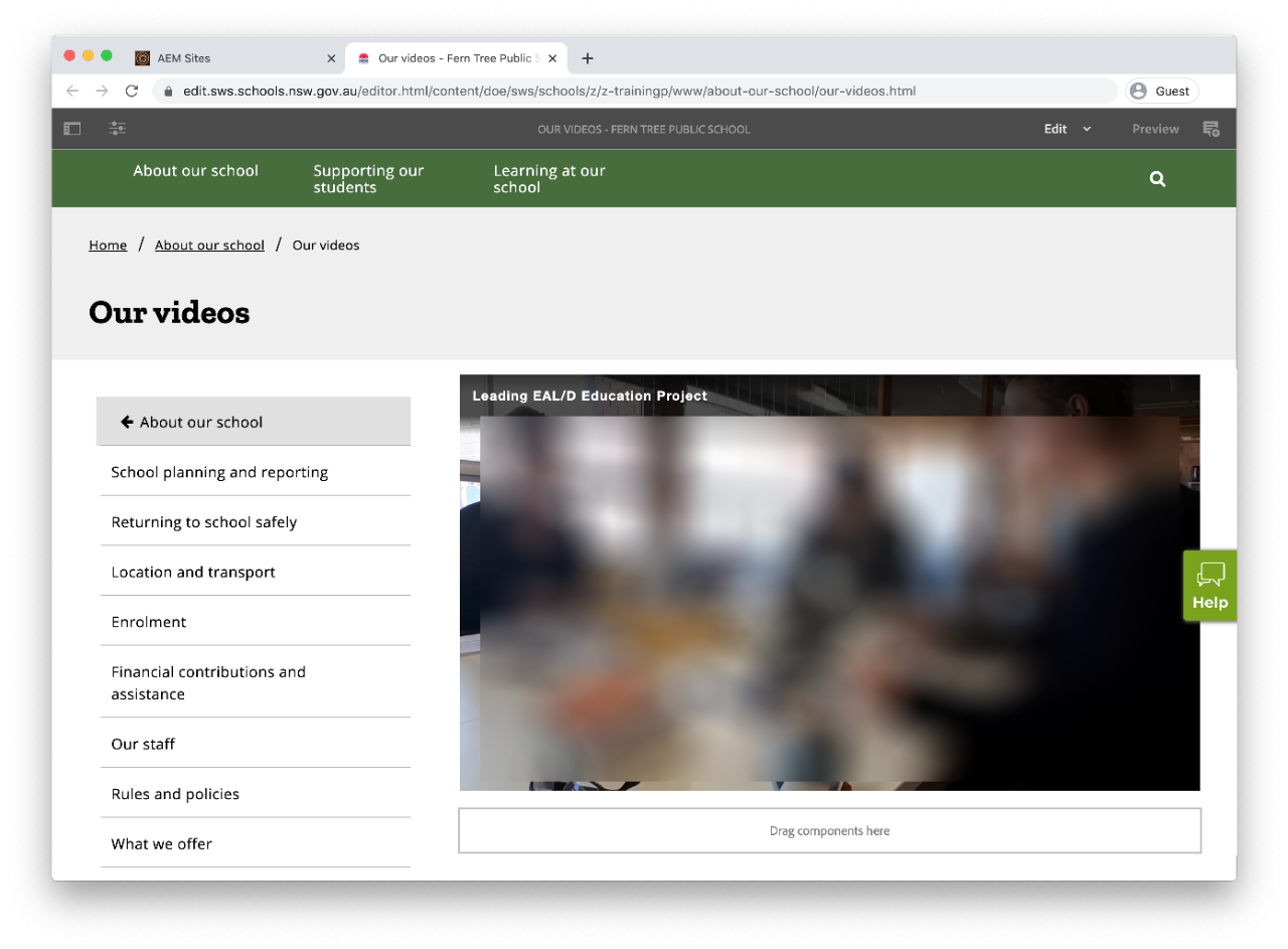 A sample page displaying a completed schools video component, with content blurred out for privacy